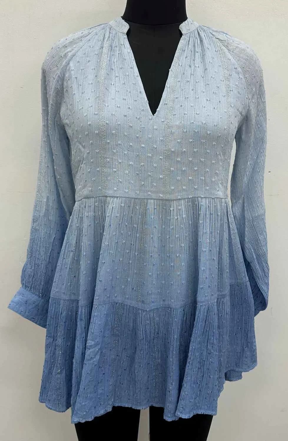 Front view of a blue ombré ombré dip-dye long-sleeve tiered mini dress on a dress form