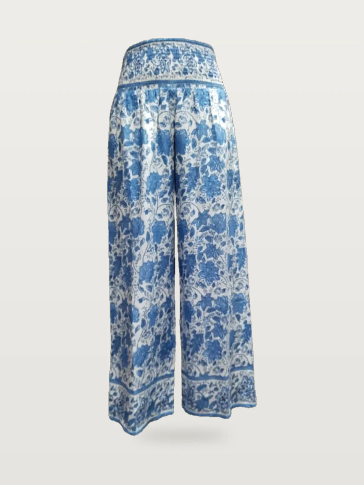 Front view of a blue and white block-print wide-leg trousers on a dress form