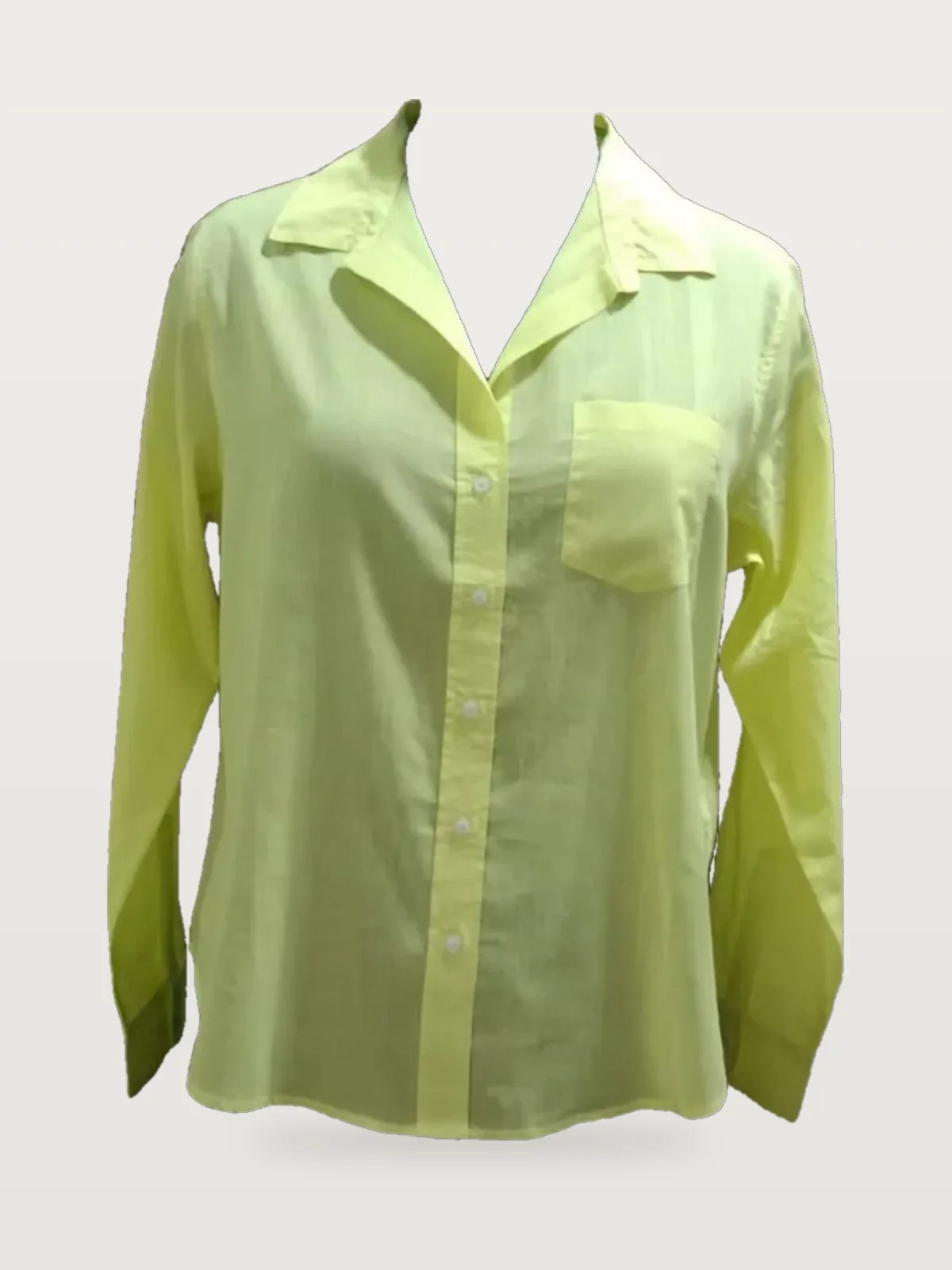 Front view of a chartreuse cotton voile long-sleeve shirt on a dress form