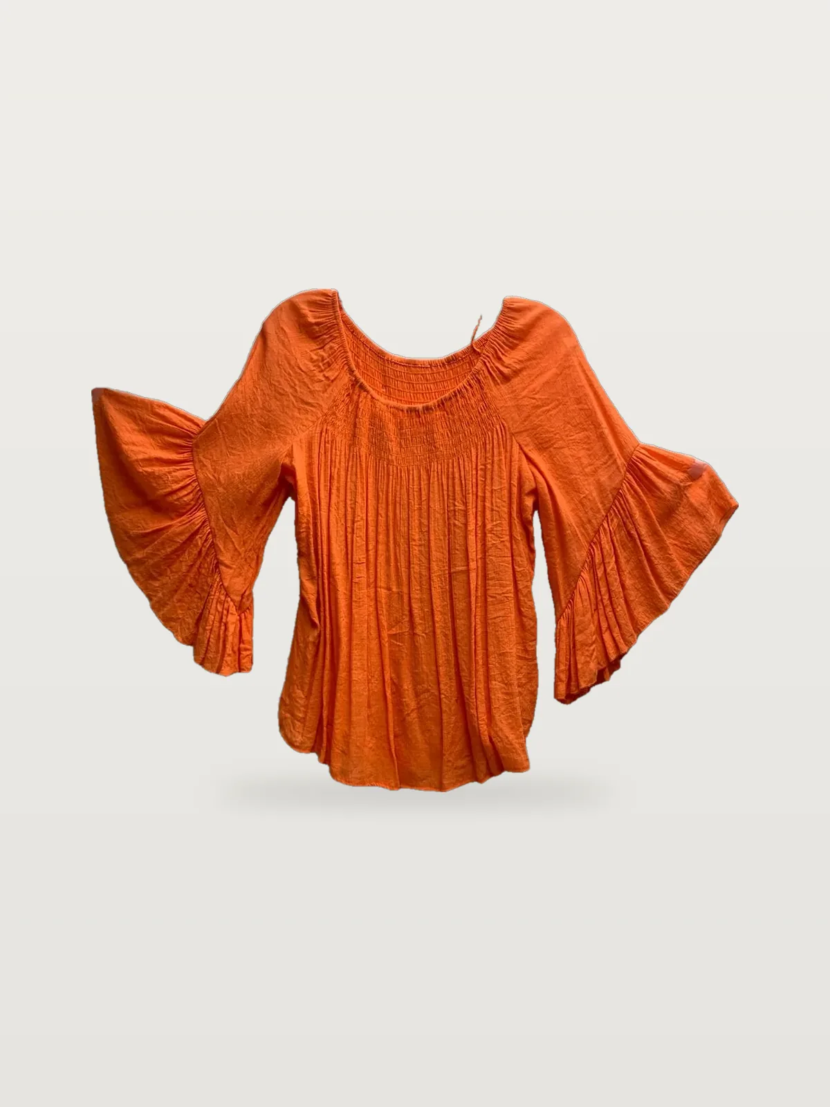 Front view of an orange crinkle bell-sleeve peasant top on a hanger