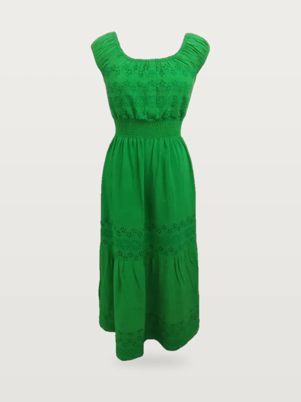 Front view of a green eyelet scoop-neck smocked maxi dress on a dress form