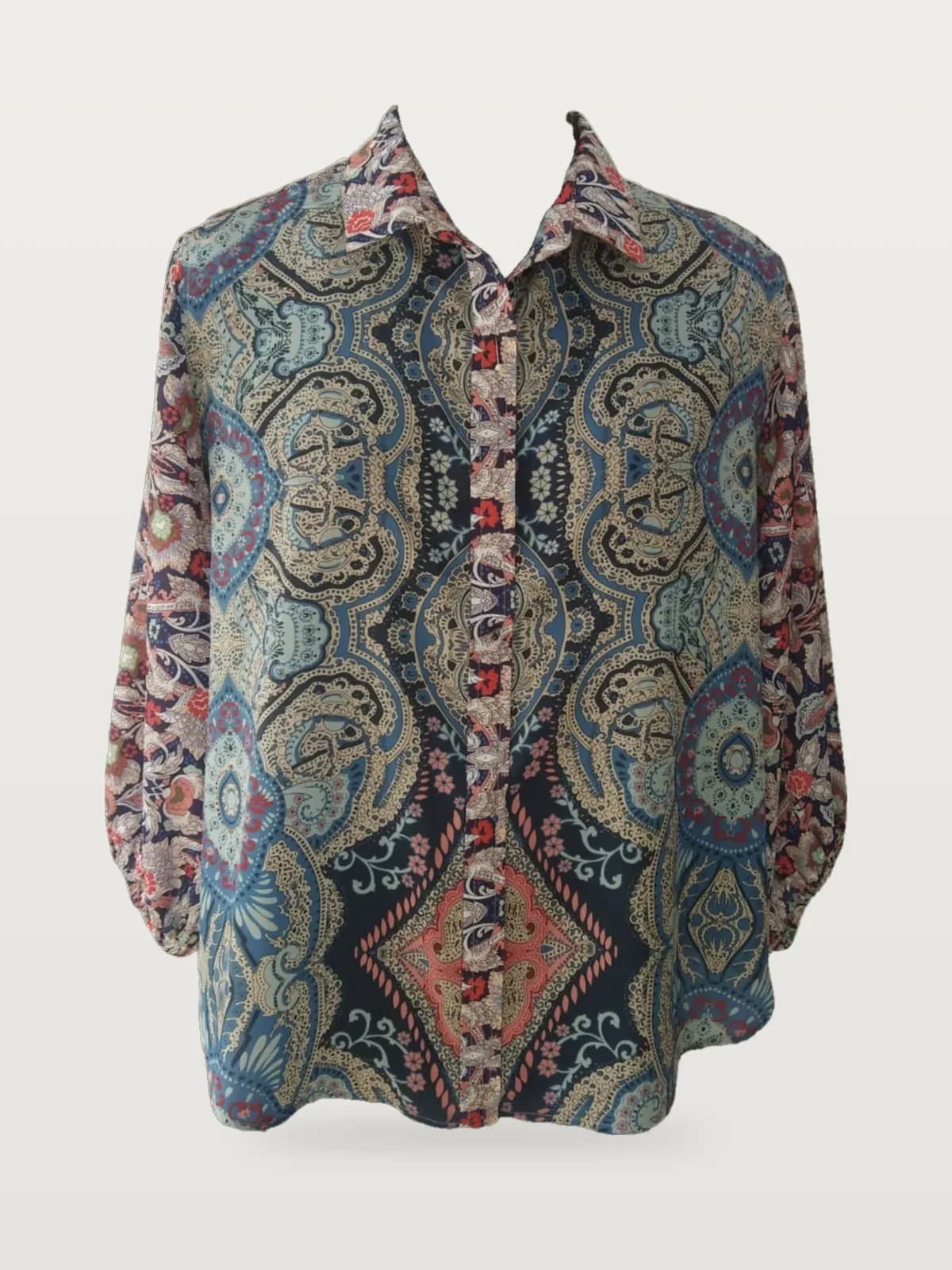 Front view of a blue multicolour paisley mirror-print long-sleeve shirt on a dress form