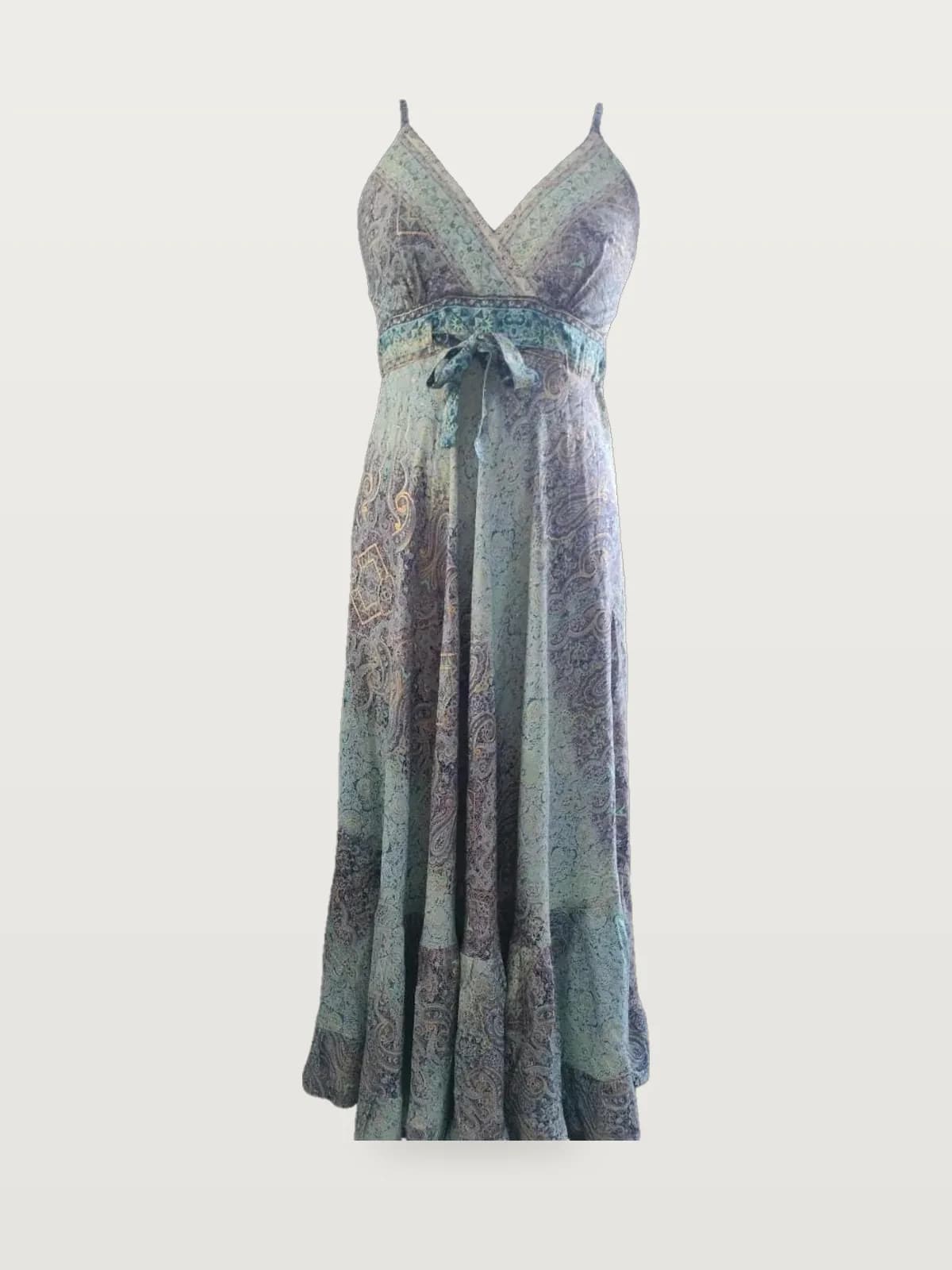 Front view of a blue and mint paisley wrap-bodice maxi dress with tie belt on a dress form