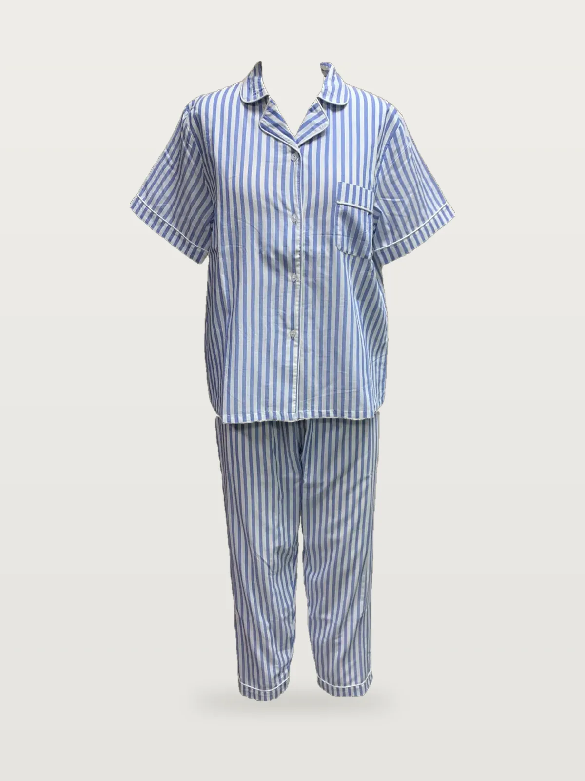 Front view of a blue and white stripe striped cotton pyjama set on a dress form