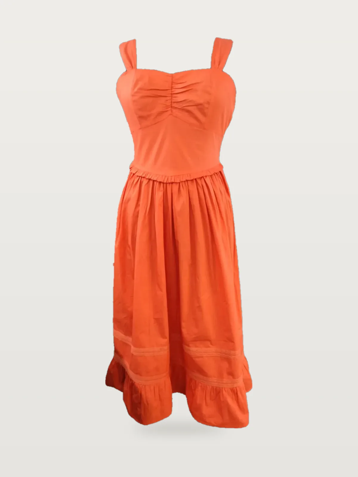 Front view of an orange sweetheart strappy midi dress with lace insertion on a dress form